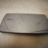 Cristal retrovisor izquierdo Ford Scort 91