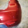 Paragolpes trasero Seat Ibiza III granate con spoiler inferior y luces matrícula
