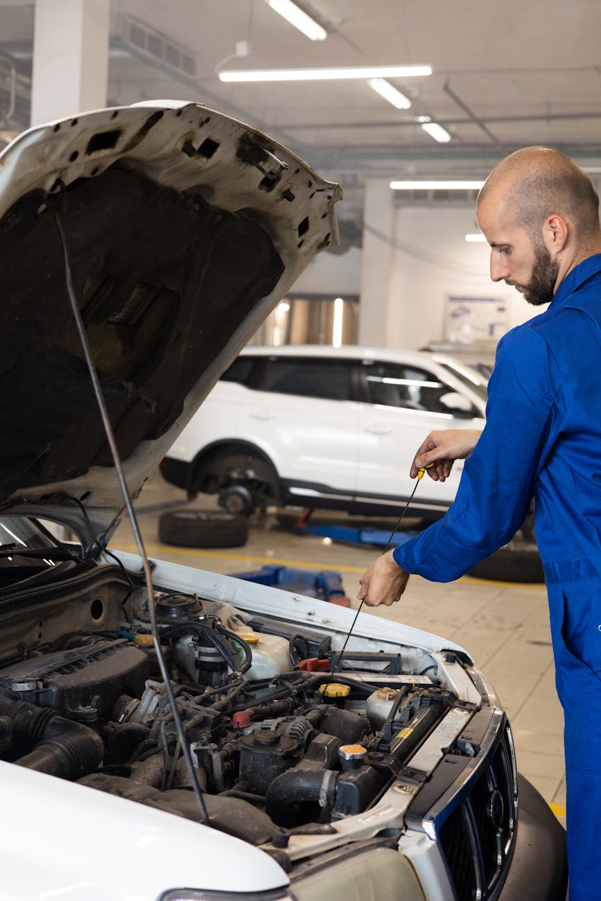man fixing the car